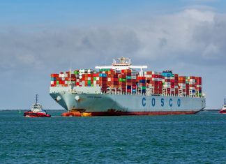 Silent cartel: How shipping giants and regulators converge to command the seas A Cosco container ship on the sea