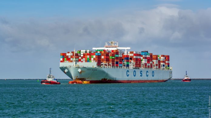 A Cosco container ship on the sea